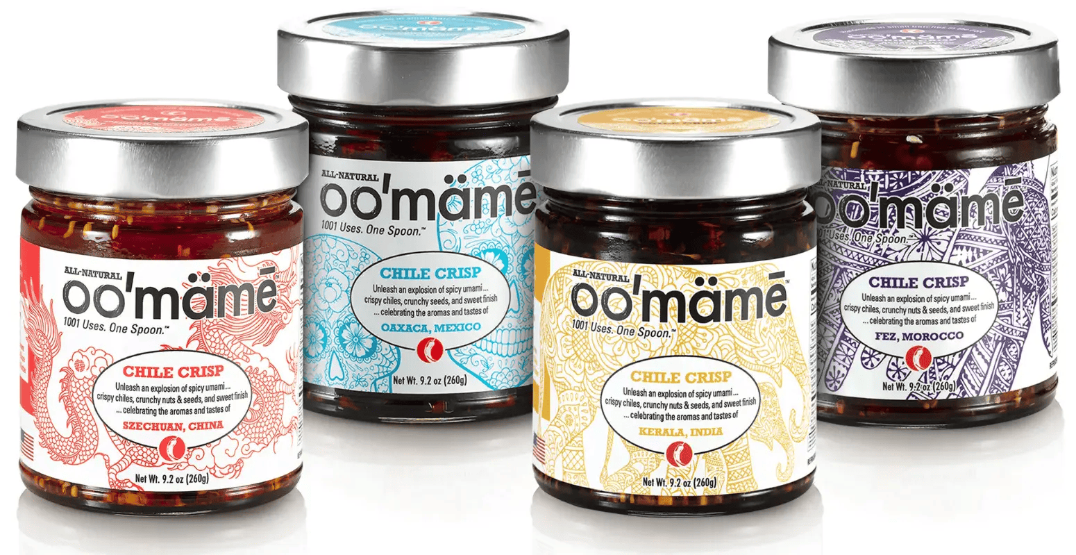 four jars of oo'mämē chile crisps: Chinese, Mexican, Indian and Moroccan