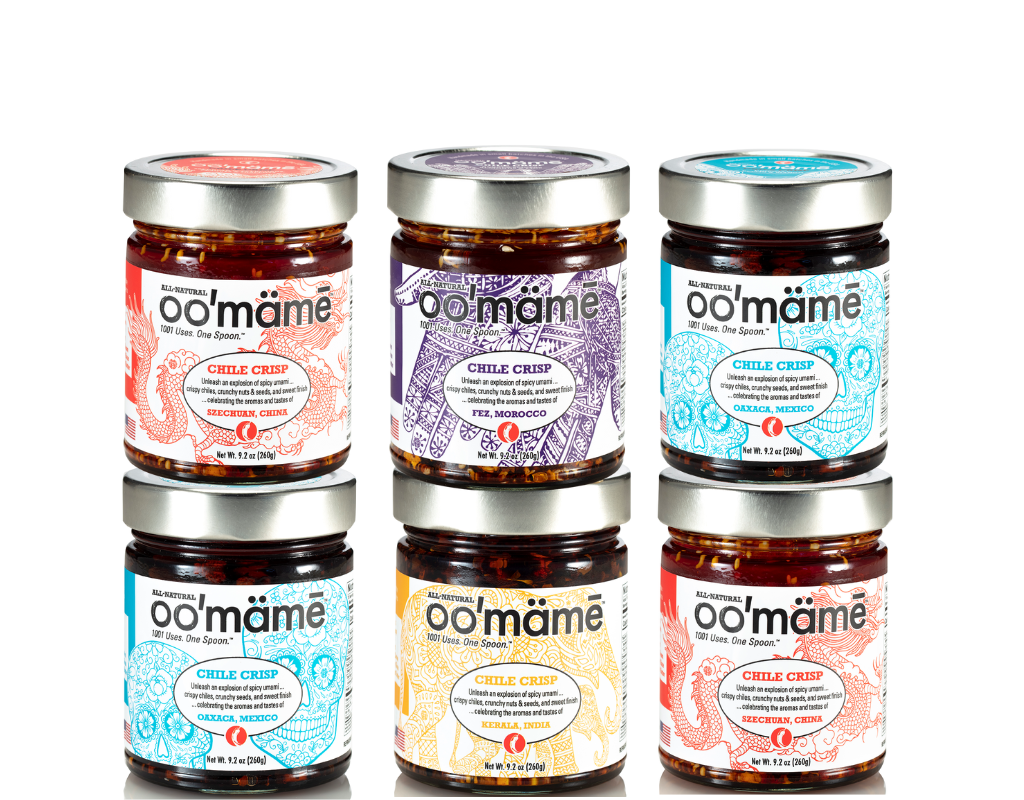 Six jars of Jars of oo’mämē Global Chile Crisp, including two jars of Chinese, 2 jars of Mexican, one jar each of Indian and Moroccan Chile Crisp